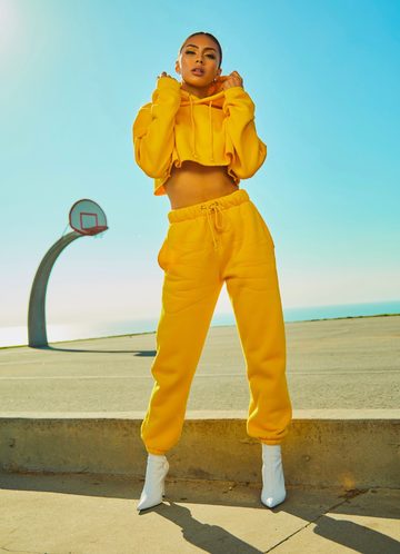Stylish fashion model posing in a city